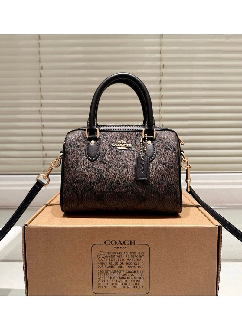 coachoutlet Coach Signature Leather Mini Handbag with Detachable Strap Authentic and Stylish - Image 1